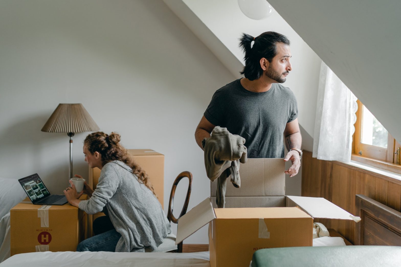 Two people moving in together into an apartment